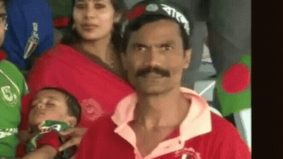 Man With Mustache Holding Baby GIF