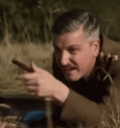 Man With Mustache Holding Cigar GIF