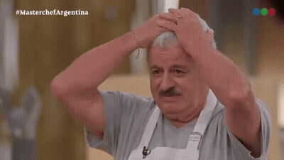 Man With Mustache Holding Head In Front Of MasterChef Argentina Logo GIF
