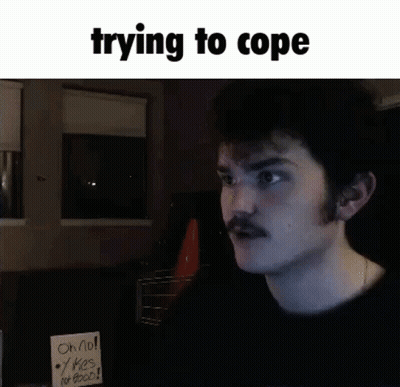 Man With Mustache Holding Sign Saying Trying To Cope GIF