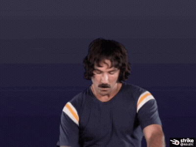 Man With Mustache Holding Sign Strike @ Rd.btc GIF