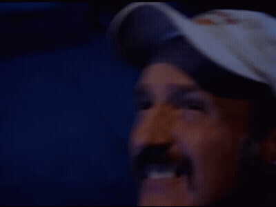 Man With Mustache In Baseball Cap Making Funny Face GIF