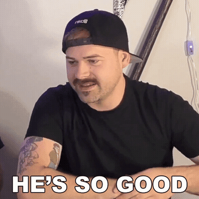 Man With Mustache In Black Hat And Shirt Saying He's So Good GIF