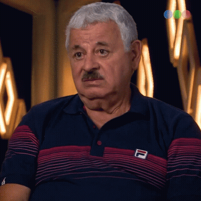 Man With Mustache In Blue And Red Fila Polo Shirt GIF