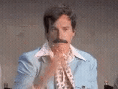 Man With Mustache In Blue Jacket And Scarf GIF