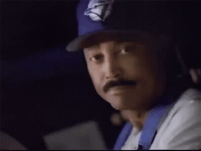 Man With Mustache In Blue Jays Hat Looking GIF