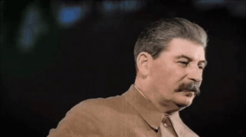 Man With Mustache In Brown Jacket And Tie GIF