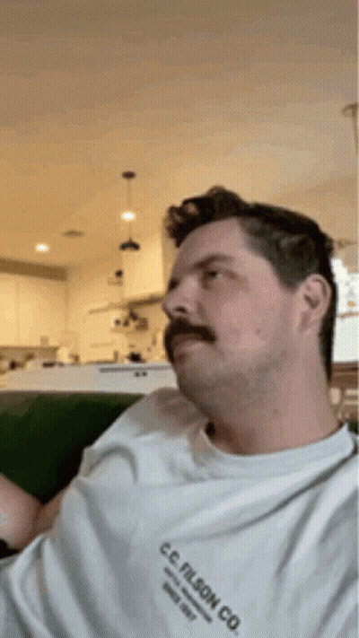 Man With Mustache In C.C. Filson Co. Shirt GIF