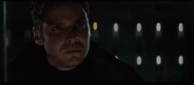 Man With Mustache In Dark Room With Lights GIF