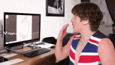 Man With Mustache In Front Of Computer GIF