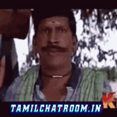 Man With Mustache In Front Of Tamil Chatroom Sign GIF