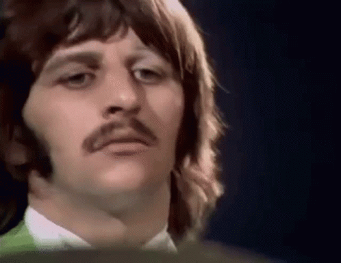 Man With Mustache In Green And White Shirt GIF