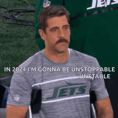 Man With Mustache In Jets Shirt In Wheelchair GIF