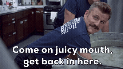Man With Mustache In Kitchen Saying Come On Juicy Mouth GIF