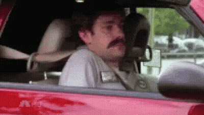 Man With Mustache In Red Car GIF