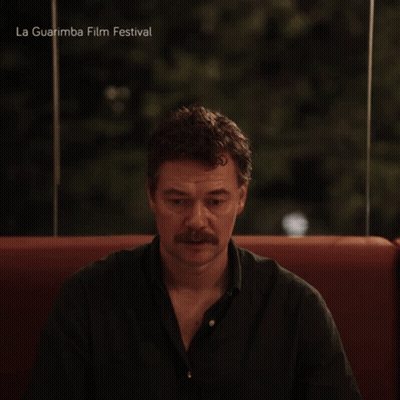 Man With Mustache In Red Chair La Guarimba Film Festival GIF