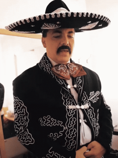 Man With Mustache In Sombrero And Jacket GIF