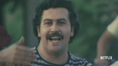 Man With Mustache In Striped Shirt And Red Hat Smiling GIF