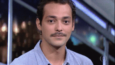 Man With Mustache Looking At Camera GIF