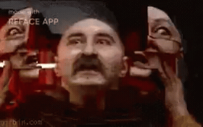 Man With Mustache Looking In Mirror GIF
