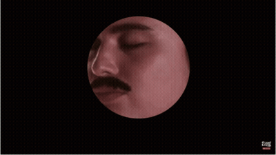 Man With Mustache Looking Through Telescope GIF