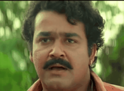 Man With Mustache Making A Face GIF