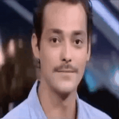 Man With Mustache Making Funny Face GIF