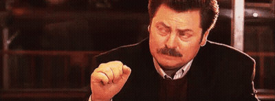 Man With Mustache Making Funny Face And Raising Fist GIF