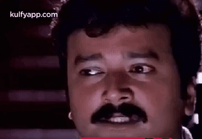 Man With Mustache Making Funny Face Eyes Closed