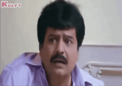 Man With Mustache Making Funny Face In Hospital Room GIF