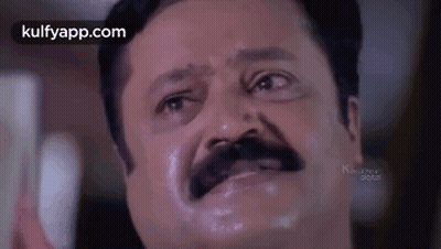 Man With Mustache Making Funny Face Looking Up GIF