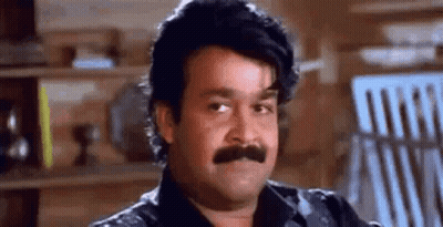 Man With Mustache Making Funny Face GIF