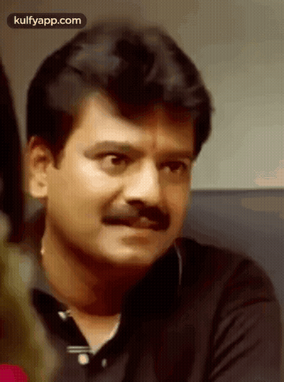 Man With Mustache Making Funny Face GIF