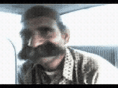 Man With Mustache Making Funny Face GIF