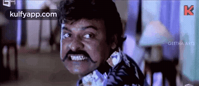 Man With Mustache Making Funny Face GIF