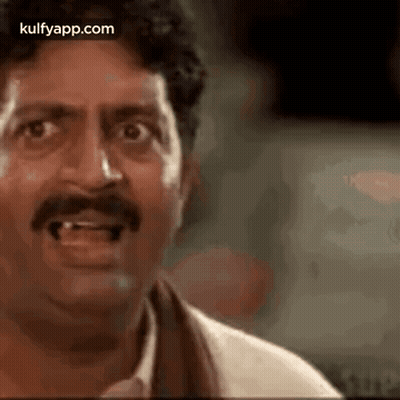 Man With Mustache Making Funny Face GIF