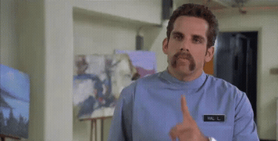 Man With Mustache Making Shhh Gesture GIF