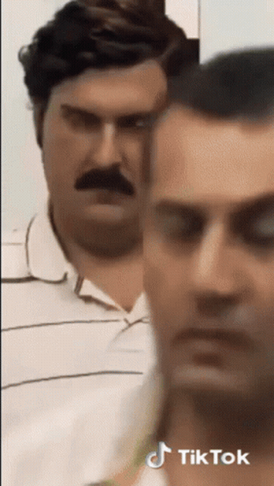 Man With Mustache Next To Man With TikTok Sticker GIF