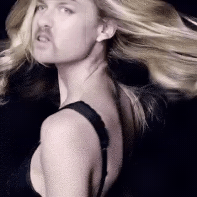 Man With Mustache Next To Woman In Bra GIF
