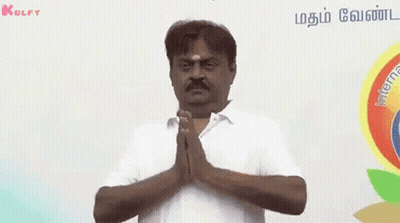 Man With Mustache Praying Before Foreign Sign GIF