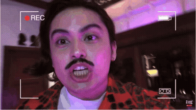 Man With Mustache Recording Video GIF
