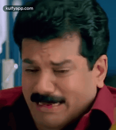 Man With Mustache Red Shirt Making Funny Face GIF