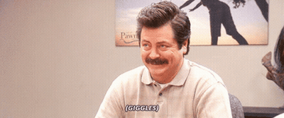 Man With Mustache Saying Giggles In Front Of Woman GIF