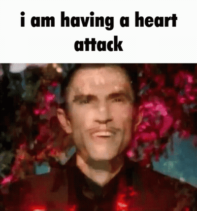Man With Mustache Saying I Am Having A Heart Attack GIF