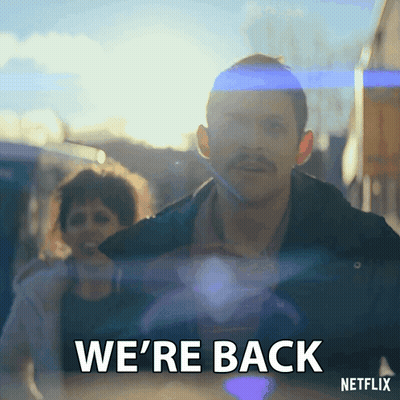 Man With Mustache Saying We're Back To Woman GIF