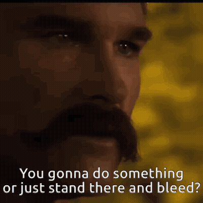 Man With Mustache Saying You Gonna Do Something Or Just Stand There And Bleed GIF