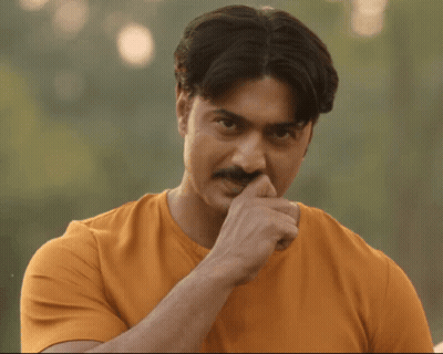 Man With Mustache Shushing