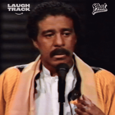 Man With Mustache Singing Laugh Track GIF