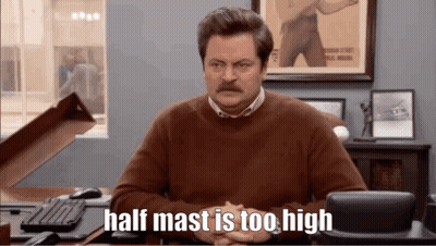Man With Mustache Sitting At Desk Half Mast Is Too High GIF