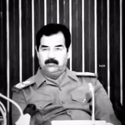 Man With Mustache Sitting At Microphone GIF